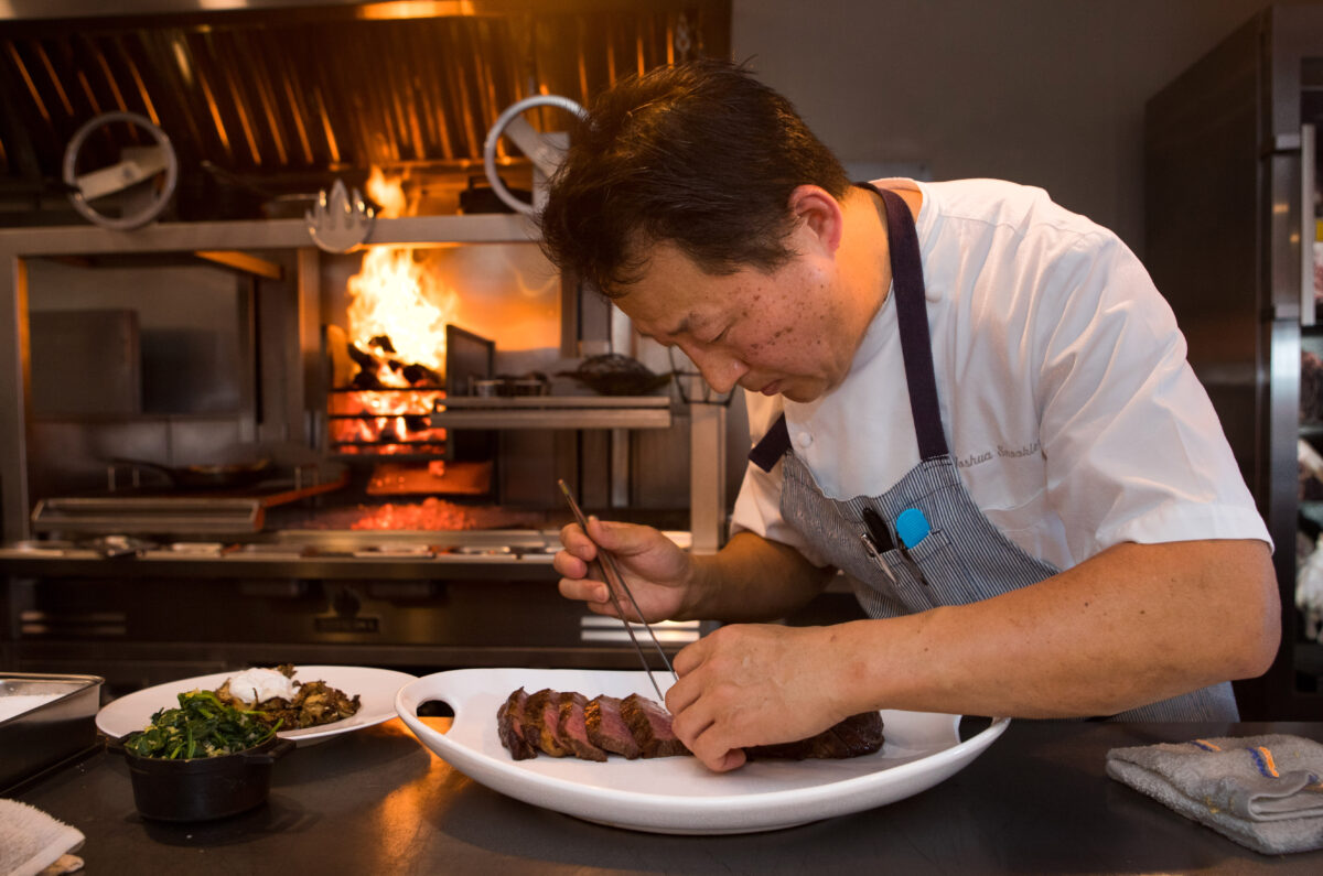 Co-owner Joshua Smookler prepares Wagyu Ribeye at his restaurant, Animo, in Sonoma, Calif., on Wednesday, March 30, 2022. (Photo by Darryl Bush / For The Press Democrat)