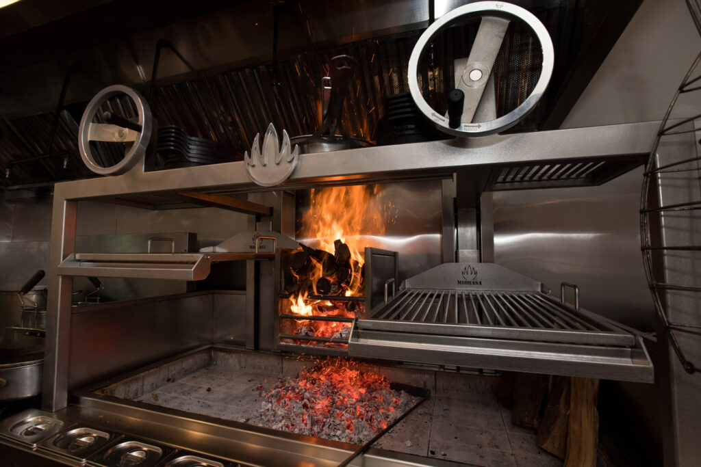 A wood-fired grill at Animo, a restaurant in Sonoma, Calif., on Wednesday, March 30, 2022. (Photo by Darryl Bush / For The Press Democrat)