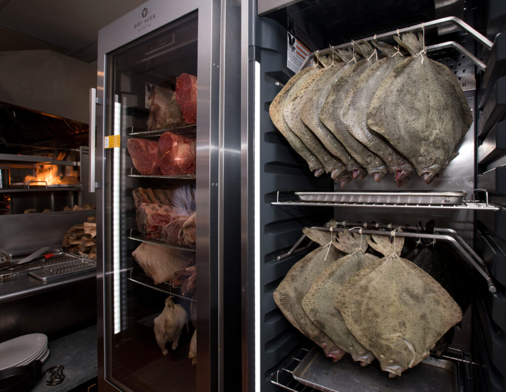 A refrigerated case holds several turbot fish from Spain, at Animo, a restaurant in Sonoma, Calif., on Wednesday, March 30, 2022. (Photo by Darryl Bush / For The Press Democrat)