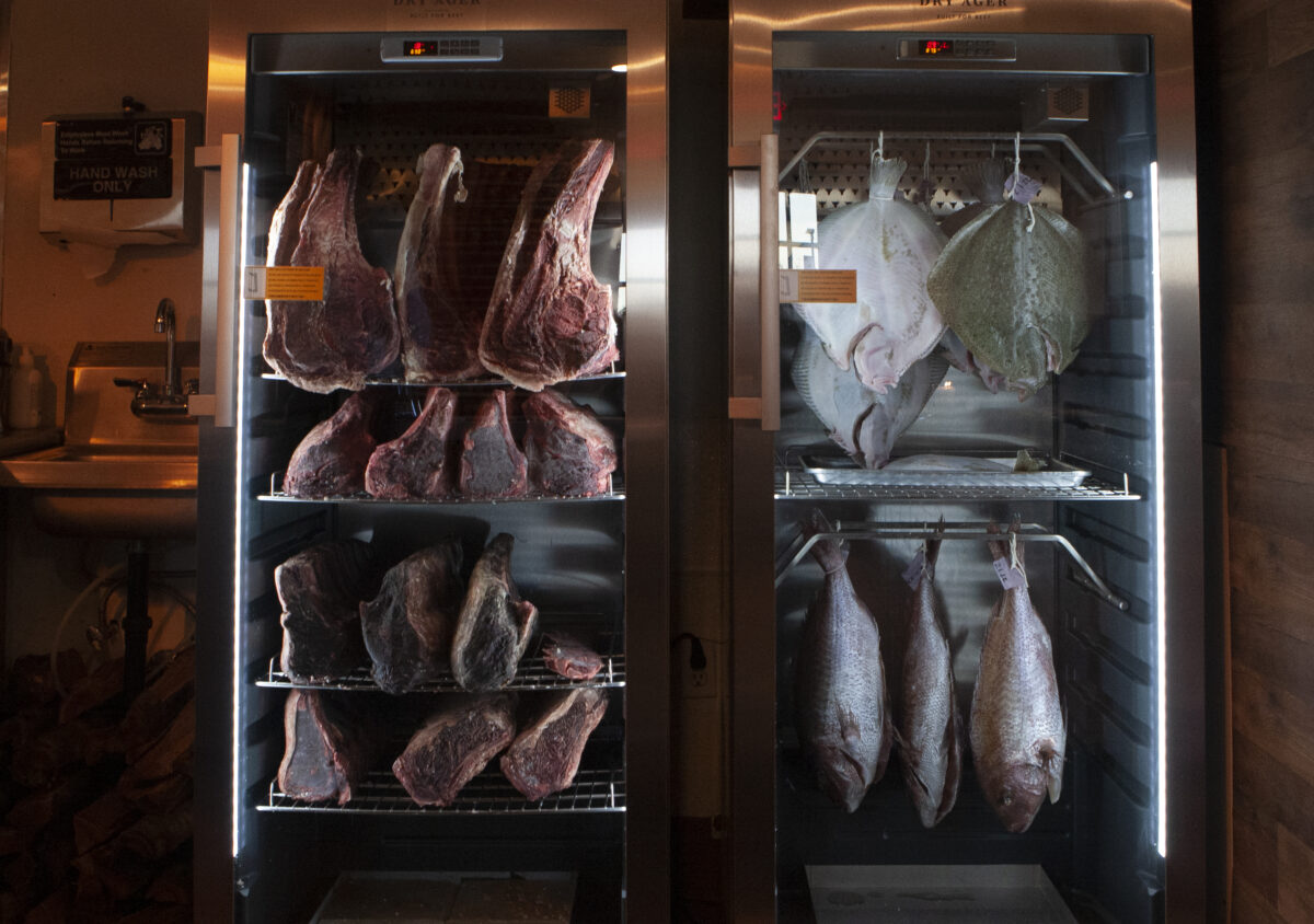 Refrigerated meats are visible in the open kitchen on the first day of service at the restaurant Animo on Highway 12, near the intersection of Verano Avenue on Wednesday, Feb. 2, 2022. (Robbi Pengelly/Sonoma Index-Tribune)