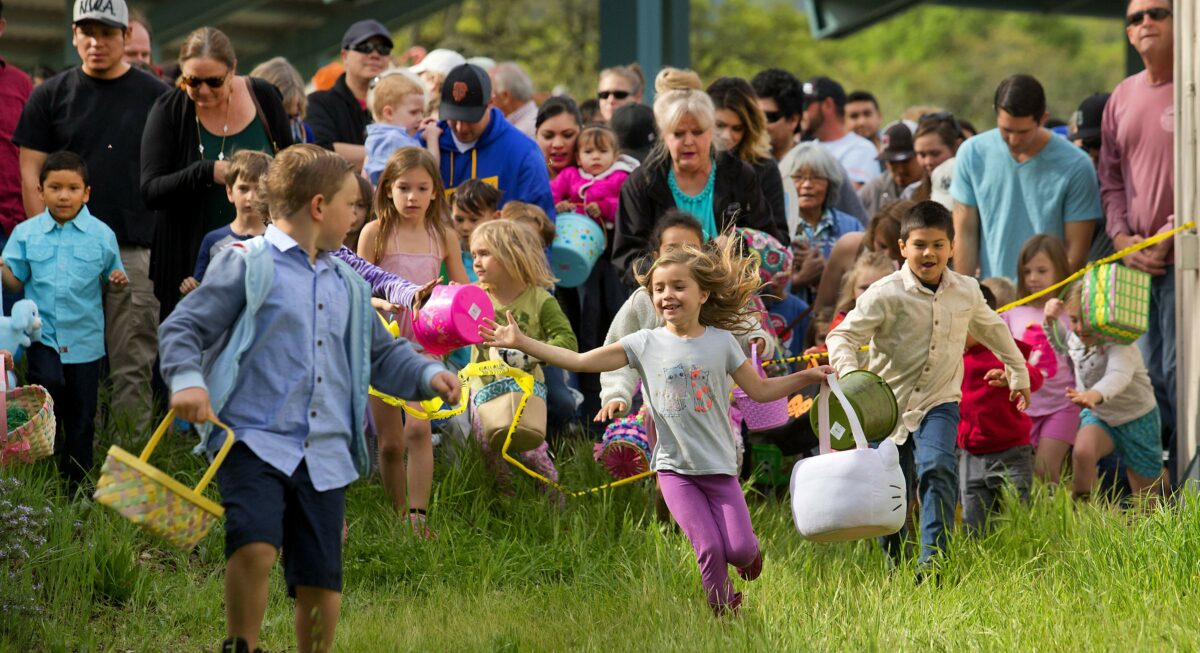 Kindergarten and first graders race at the start of the 30th annual Glen Ellen Easter egg hunt at Dunbar School. (John Burgess/The Press Democrat)