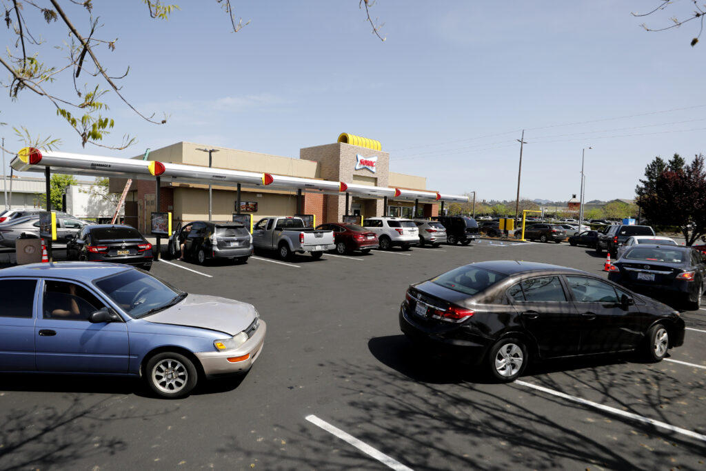 Cars snake through the parking lot as customers wait to order at the newly opened Sonic Drive-In on Santa Rosa Ave. in Santa Rosa, Calif., on Thursday, April 7, 2022.(Beth Schlanker/The Press Democrat)
