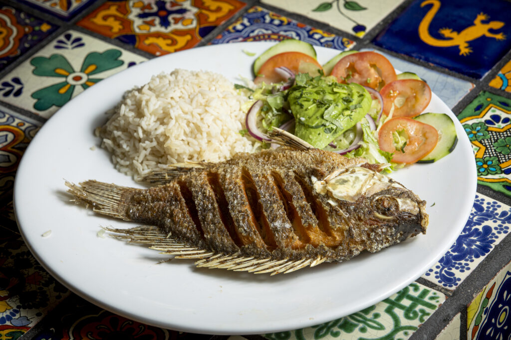 Whole deep fried tilapia from Pezcow in Windsor on Friday, April 1, 2022. (John Burgess/The Press Democrat)