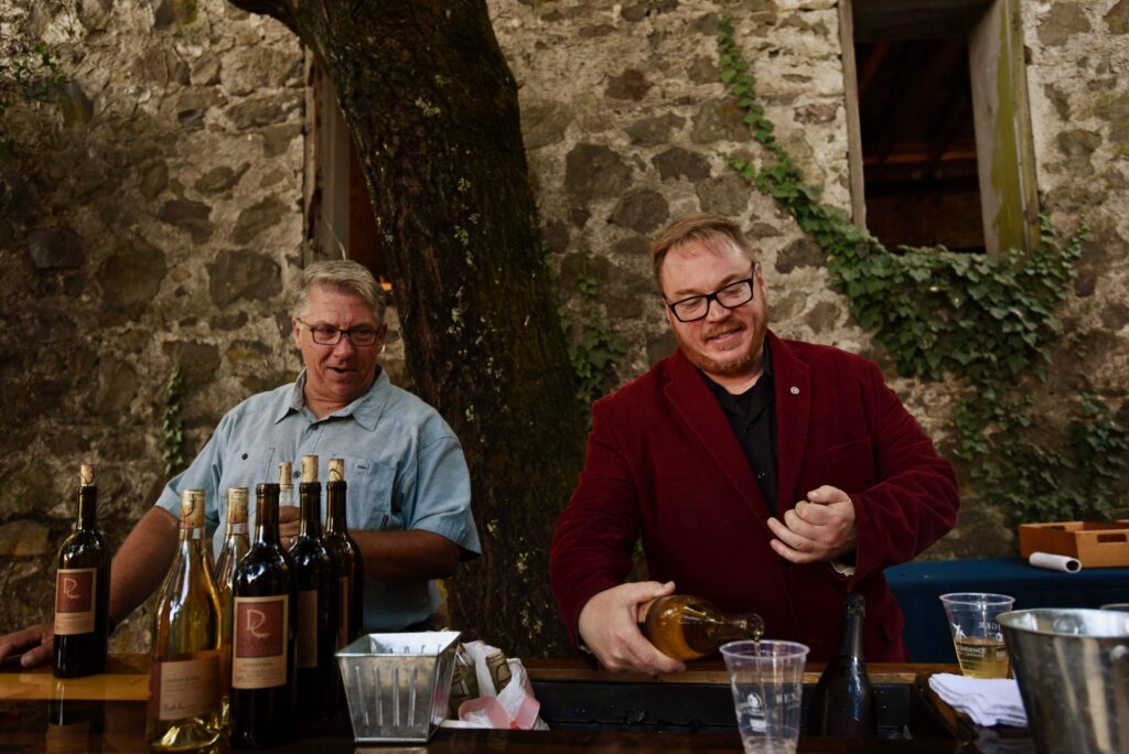 Bart Hansen, left, of Dane Cellars with Jason Michael Craig of Paradise Ridge Winery pouring wines to guests in the VIP section during the pre-show picnic at the Gala Celebration marking the closing of the 2019 summer season for Broadway Under The Stars held Friday at Jack London State Historic Park in Glen Ellen, California. September 6, 2019.(Photo: Erik Castro/for The Press Democrat)