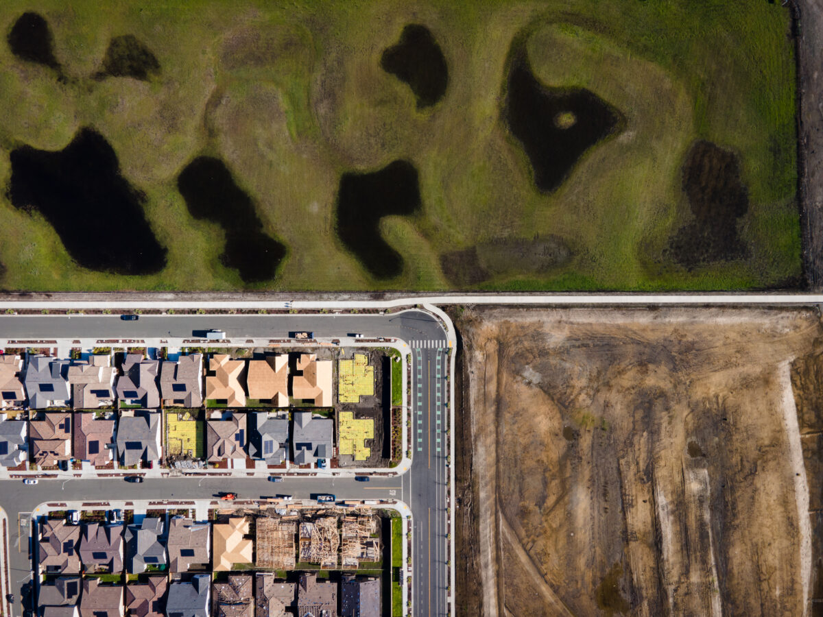 On the eastern edge of Rohnert Park, new development stamps order upon a sea of wild green grass, painted with wisps of seasonal pools. (John Beck/for Sonoma Magazine)