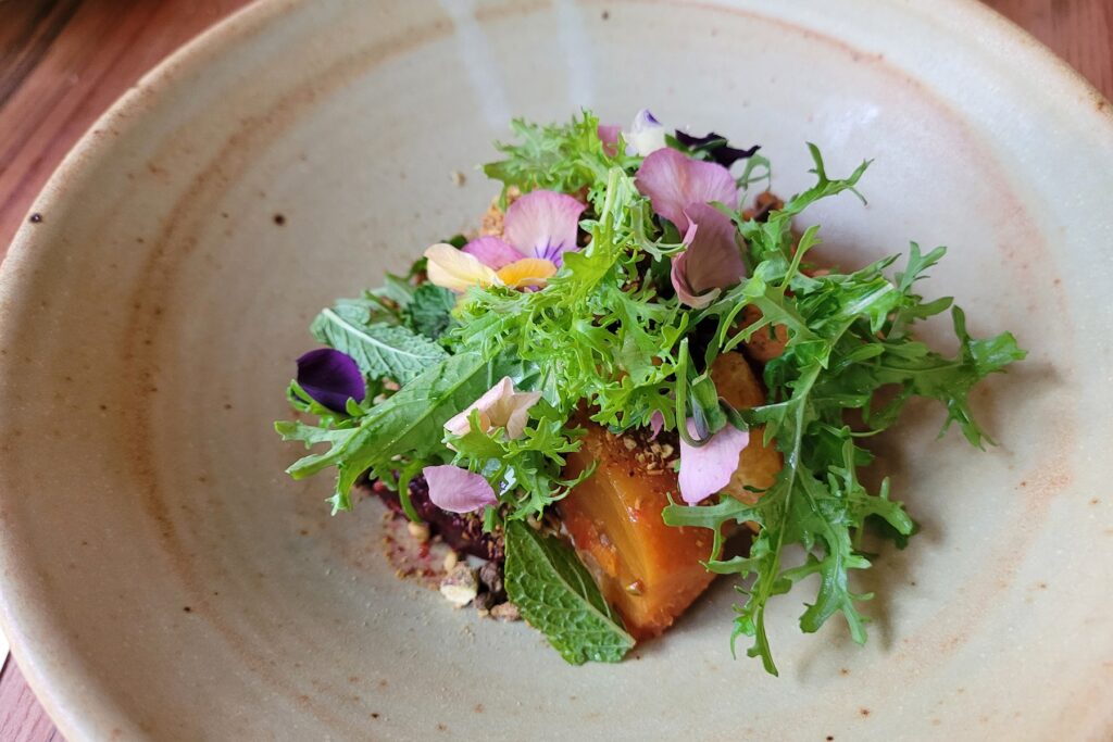 Roasted beets with mandarin achar, pistachios and mint at Little Saint in Healdsburg. (Heather Irwin/The Press Democrat)