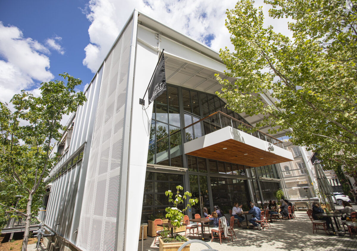 Guests at Little Saint enjoy the front patio in downtown Healdsburg on April 22, 2022. (Chad Surmick/The Press Democrat)