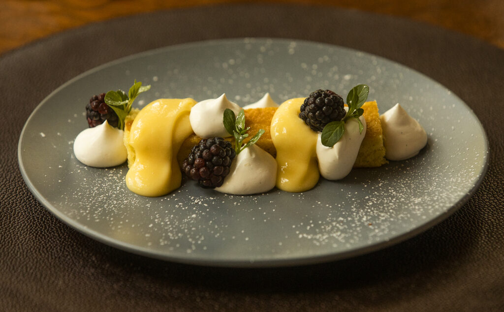 Dry Creek Olive Oil Cake with citrus curd, blackberries, mint from Dry Creek Kitchen in Healdsburg. (John Burgess/The Press Democrat)