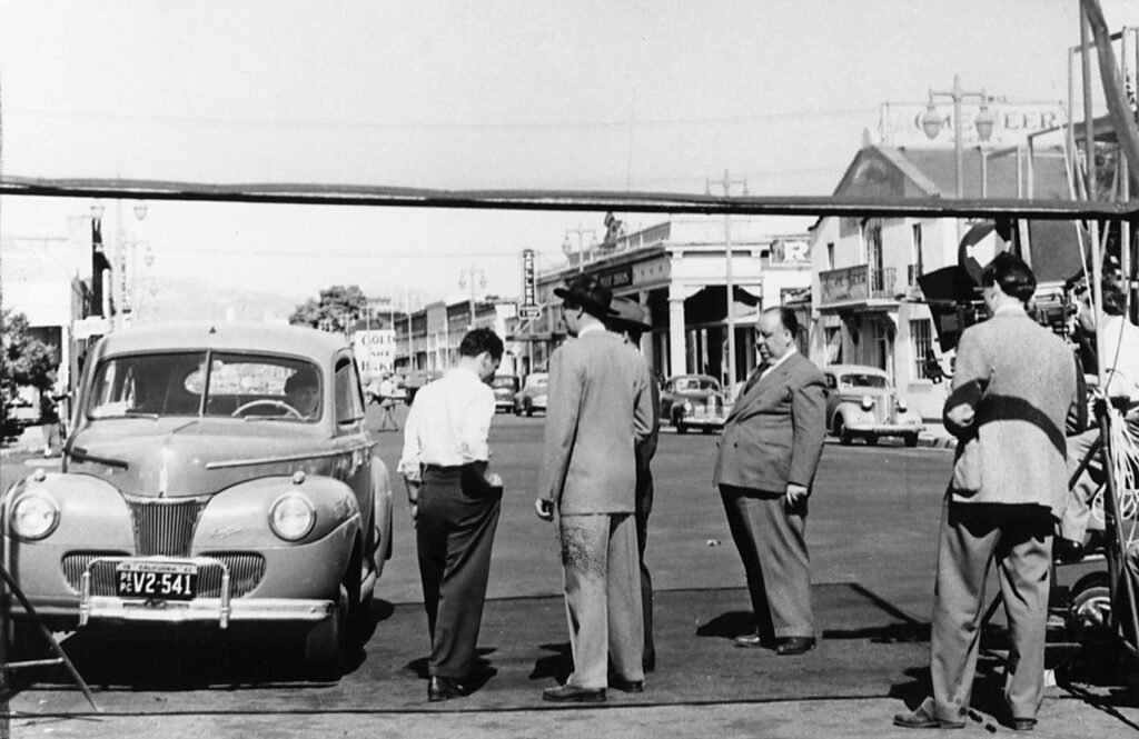 1942 - Alfred Hitchcock during filming of 'Shadow of a Doubt' at NWP Depot (now Railroad Square) in Santa Rosa.