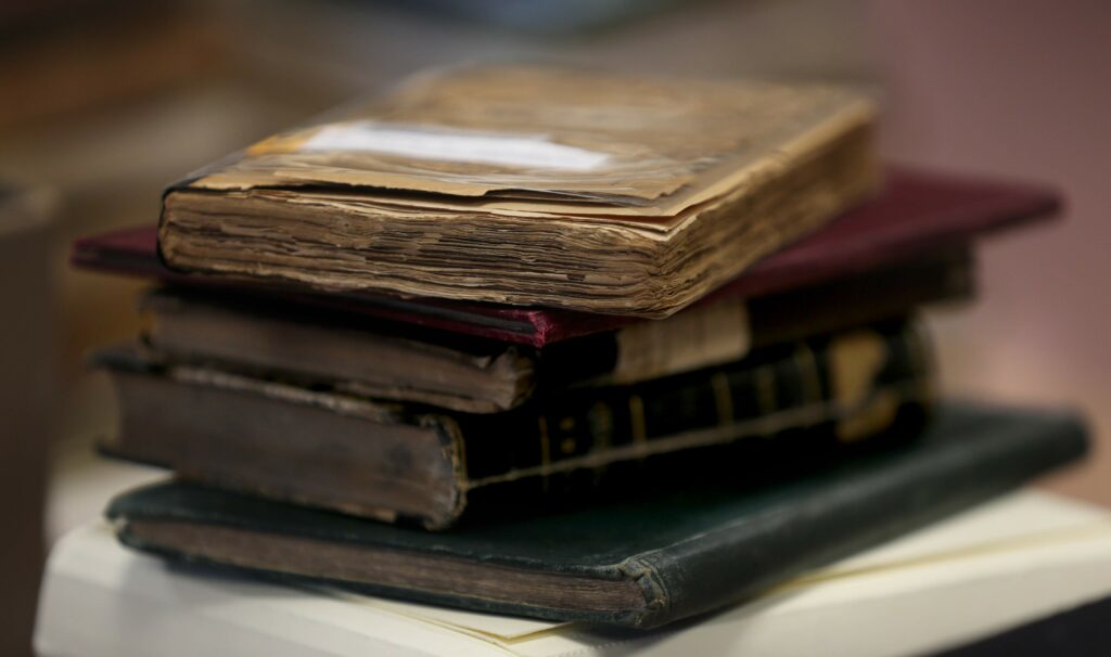 A stack of rare books about wine and grape growing at the Sonoma County Wine Library in Healdsburg. (Beth Schlanker/The Press Democrat)