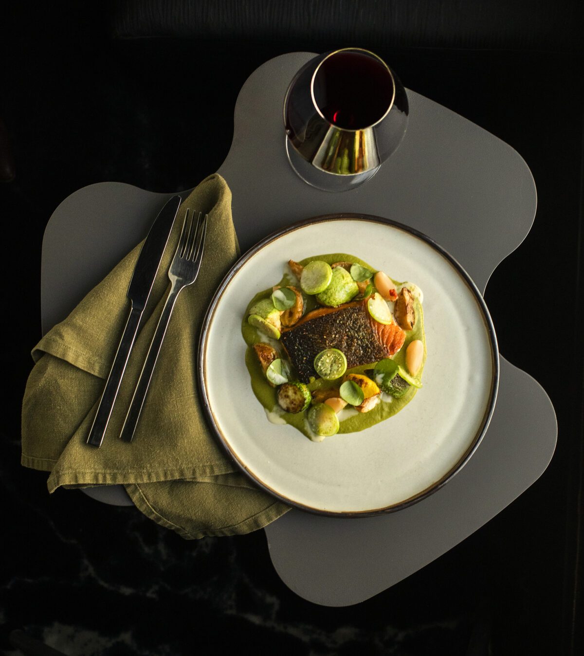Seared King Salmon with roasted turnips, sorrel, shishito's, squash and a tomatillo sauce served with 2012 Stone Edge Farm Cabernet Sauvignon from EDGE restaurant in Sonoma. (John Burgess/The Press Democrat)