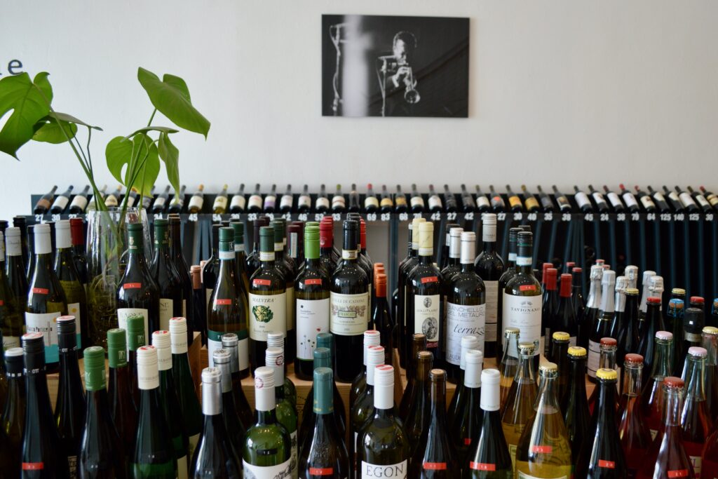 Damien Carney's jazz heroes line the walls of his Avinage wine shop in Petaluma. (Tina Caputo)