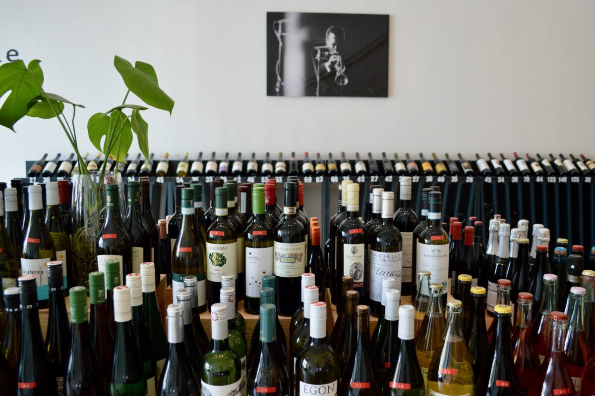 Damien Carney's jazz heroes line the walls of his Avinage wine shop in Petaluma. (Tina Caputo)