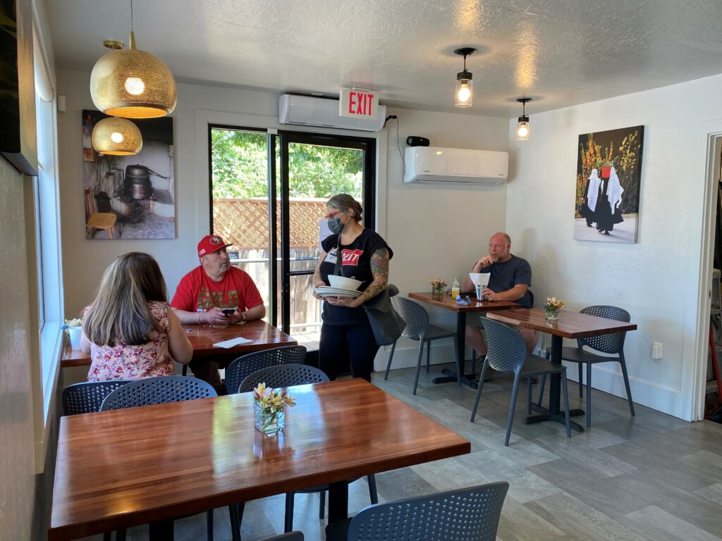 Chef and owner Cristina Topham chats with customers at her new restaurant, Spread Kitchen, in Boyes Hot Springs on Monday, May 23. (Allison Coats/Spread Kitchen)