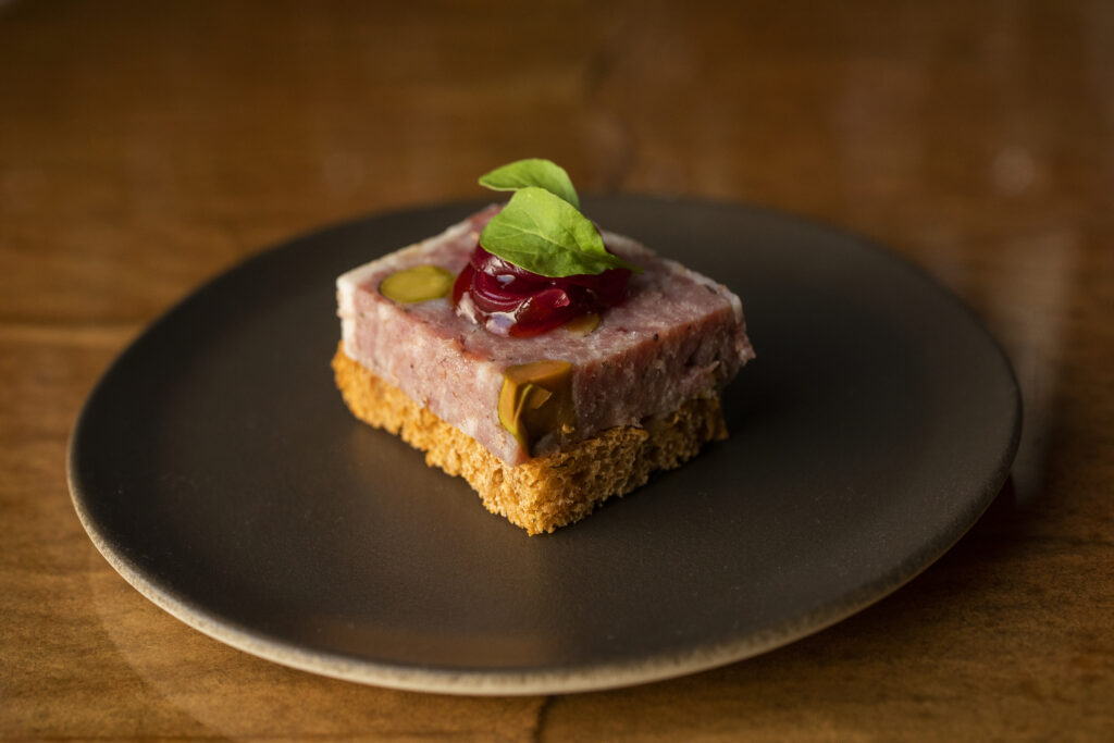 Duck pate with zucchini focaccia and plum from EDGE restaurant in Sonoma. (John Burgess/The Press Democrat)