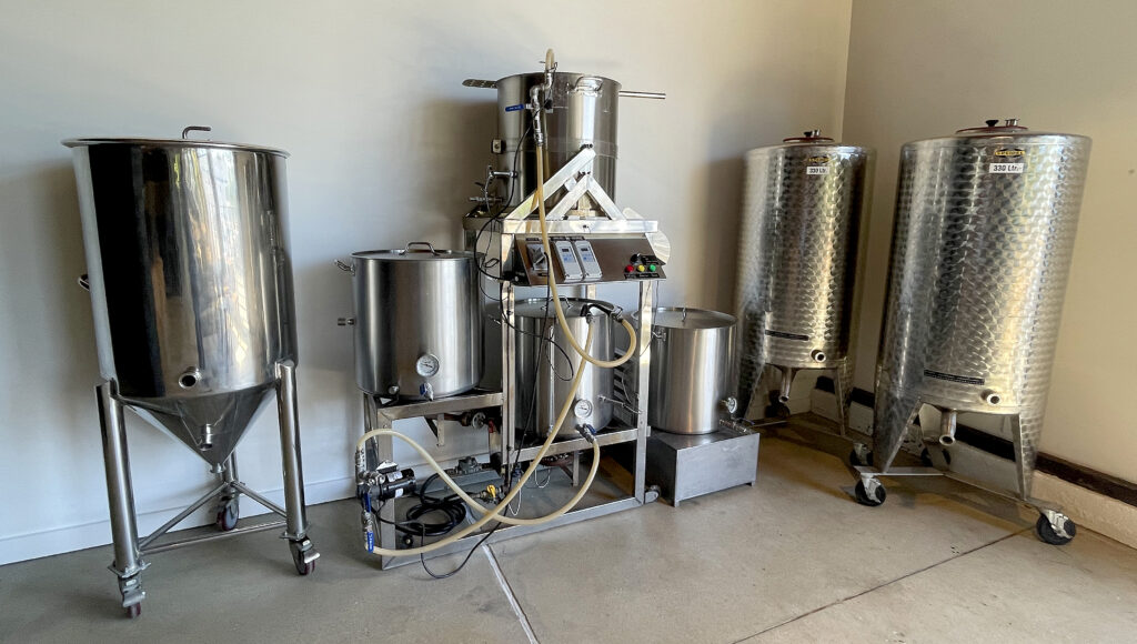 The original equipment used by the 7 partners when they started brewing together in 2012 decorates the new Crooked Goat Brewing Co. taproom on Howard St. in Petaluma on May 17, 2022. (John Burgess/The Press Democrat)
