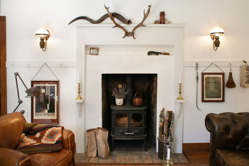 The living room fireplace, replastered by Lewis. (Eileen Roche)