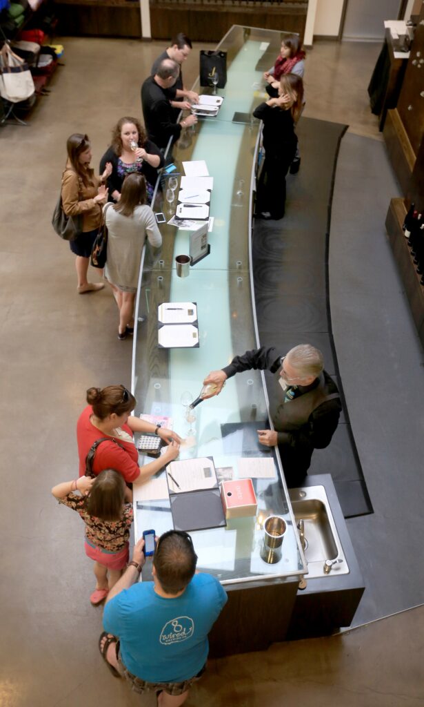 The J Vineyards & Winery tasting room is busy, Tuesday March 24, 2015, minutes after E & J Gallo Winery purchased the Healdsburg-based winery. (Kent Porter / Press Democrat) 2015
