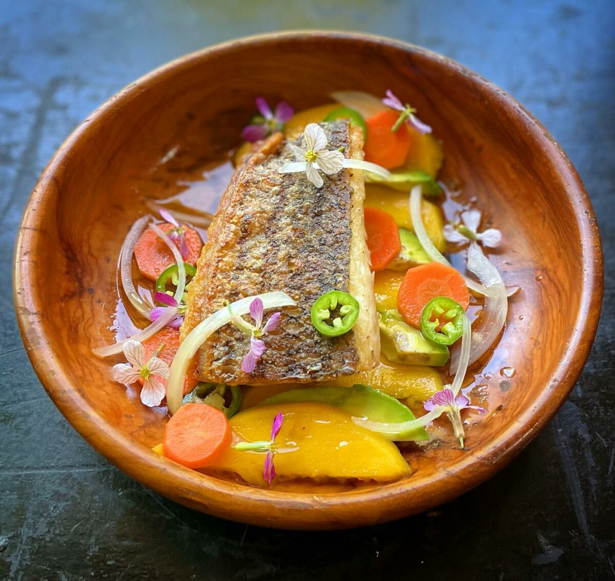 Baja striped bass with escabeche, Valencia Pride mango and Zutano avocado at Street Social. (Courtesy of Street Social)