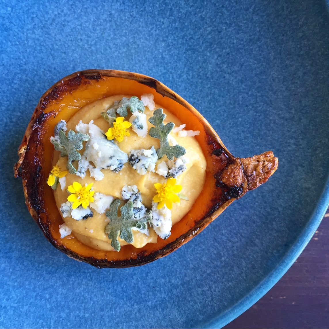Roasted heirloom red kuri squash with smoked onion custard, stilton and yarrow at Street Social. (Courtesy of Street Social)