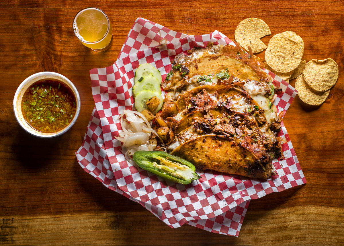 Quesabirria meaty tacos with a side of consome from the Tacos Tijuana food truck at Shady Oak Barrel House in Santa Rosa on Friday, October 22, 2021. (Photo by John Burgess/The Press Democrat)