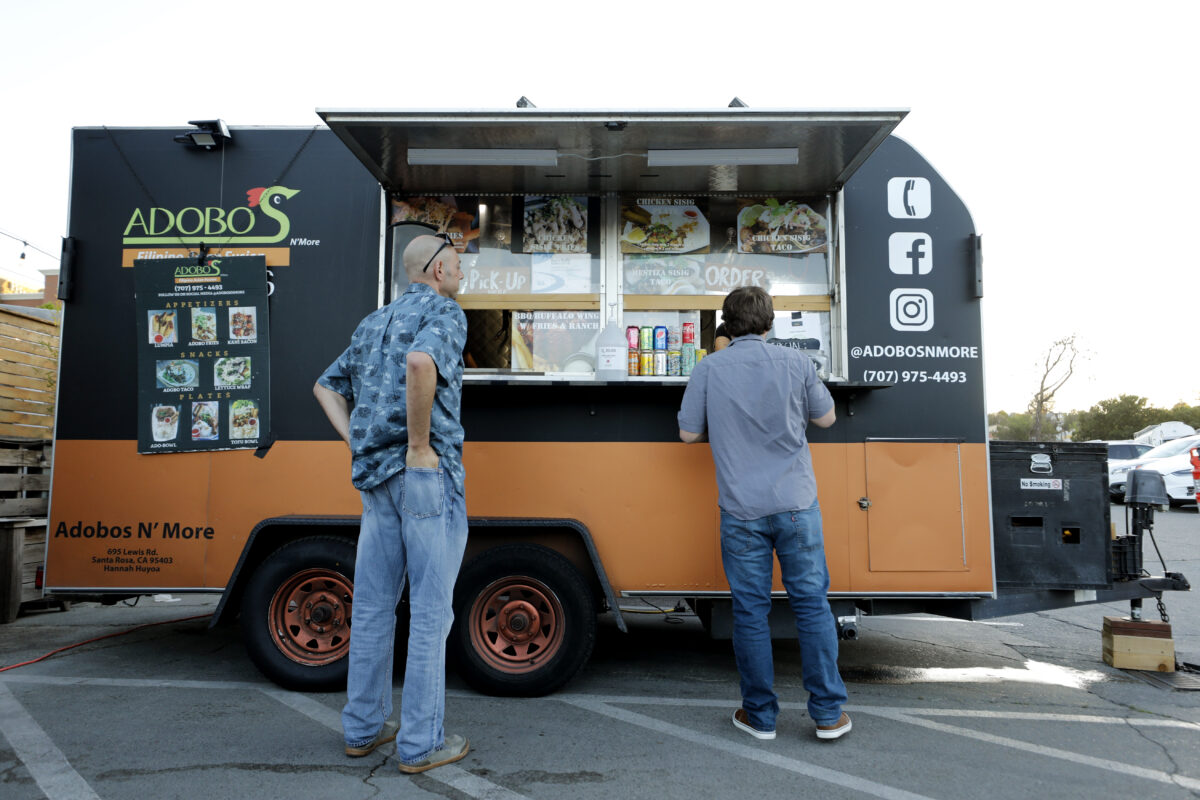 Adobos N' More food truck at The Block food park in Petaluma. (Beth Schlanker/The Press Democrat)