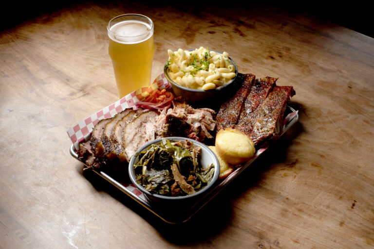 A tray full of ribs and brisket and all the fixings of Austin's Southern Smoke BBQ at Old Possum Brewing Co. in Santa Rosa. (Erik Castro/for Sonoma Magazine)