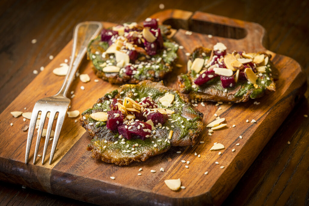 Beet Bruschetta with homemade pesto on green plantains from Kina's Kitchen & Bar in Sonoma. (John Burgess / The Press Democrat)