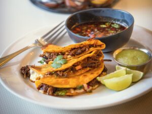Birria Tacos with adobo marinated beef served with consomÈ from Kinaís Kitchen & Bar in Sonoma. (John Burgess / The Press Democrat)