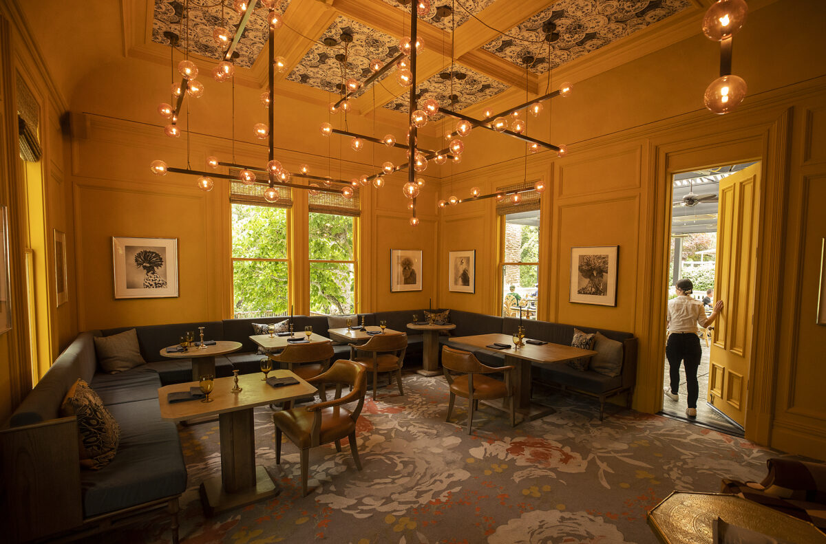 A warm ambiance in one of the three dining areas at The Madrona in Healdsburg Friday, June 3, 2022. (John Burgess / The Press Democrat)