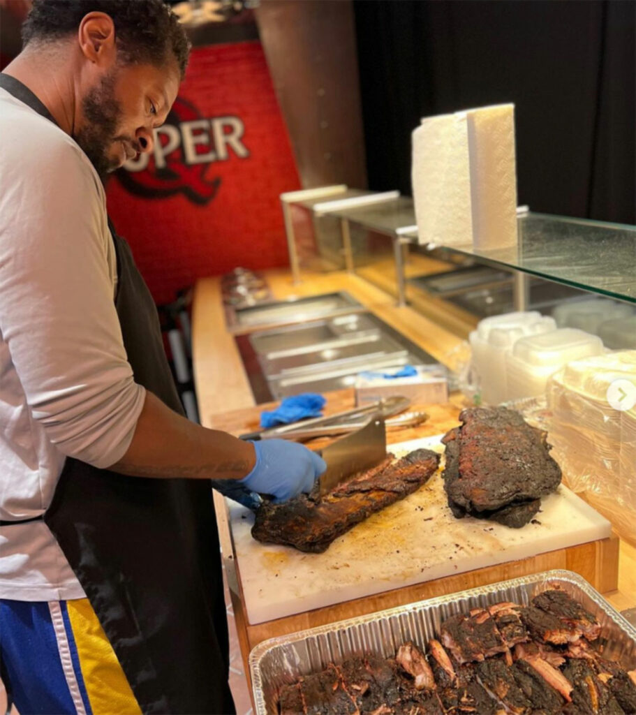 Shamar Cotton prepares barbecue for local nonprofits before the opening of Everett & Jones Bar-B-Q at the Graton Resort & Casino. (Shamar Cotton)