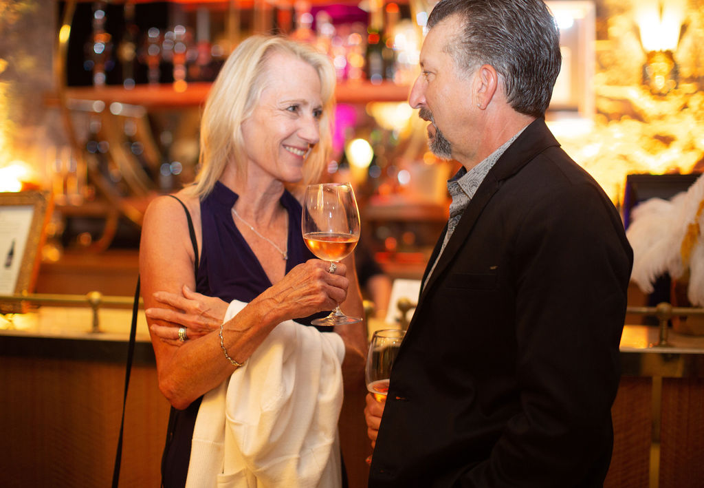 Cathy Larsen and her husband Seth Lyle enjoy a glass of wine at the Sonoma Magazine 10th Anniversary Party at Buena Vista Winery in Sonoma, CA which took place on July 28, 2022. (Photo by Charlie Gesell)