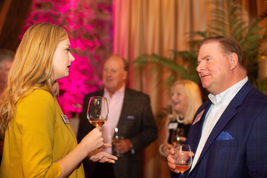 Brytann Busick, left, of Sonoma Clean Power, left, talks with Press Democrat Executive Editor Rick Green at the Sonoma Magazine 10th Anniversary Party at Buena Vista Winery in Sonoma, CA. The event took place on July 28, 2022. (Photo by Charlie Gesell)