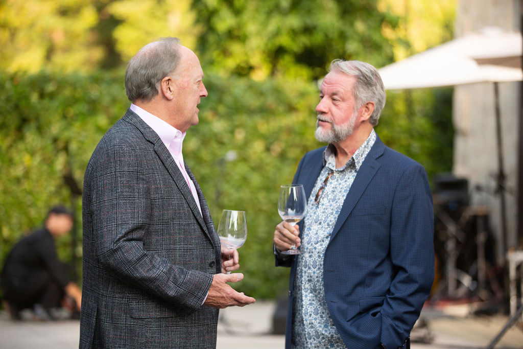 Steve Falk, Chief Executive Officer of Sonoma Media Investments speaks with Notre Vue Estate General Manager Geoffrey Thompson at the Sonoma Magazine 10th Anniversary Party at Buena Vista Winery in Sonoma, CA. The event took place on July 28, 2022. (Photo by Charlie Gesell)