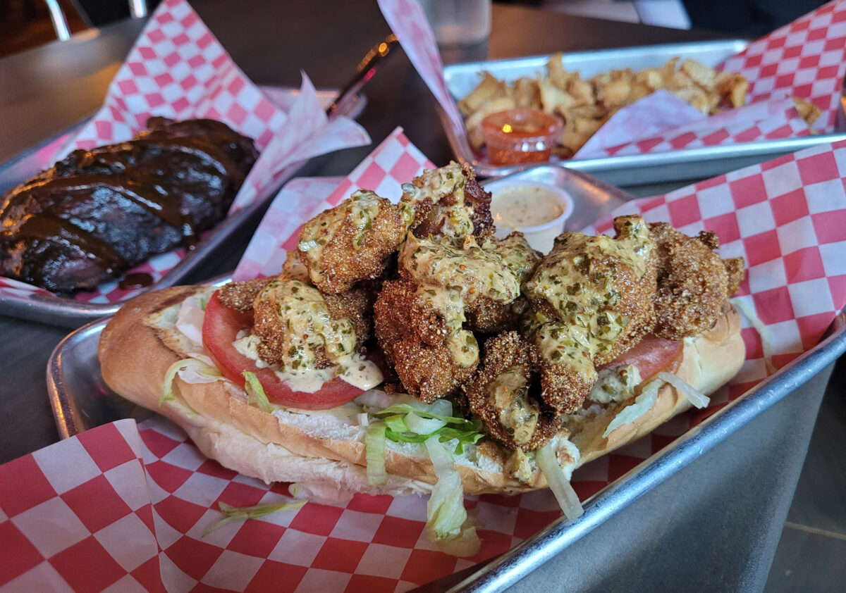 Shrimp po boy, barbecue chicken and cracklings at Saucy Mama’s Jook Joint in Guerneville. (Heather Irwin / The Press Democrat)