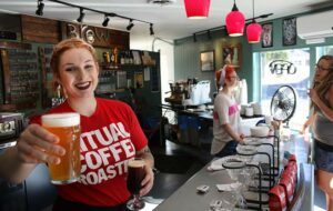Loren Hansen, 29, of Sebastopol serves up coffee and beer for happy hour at Brew in Santa Rosa. (Heather Irwin/Sonoma Magazine)