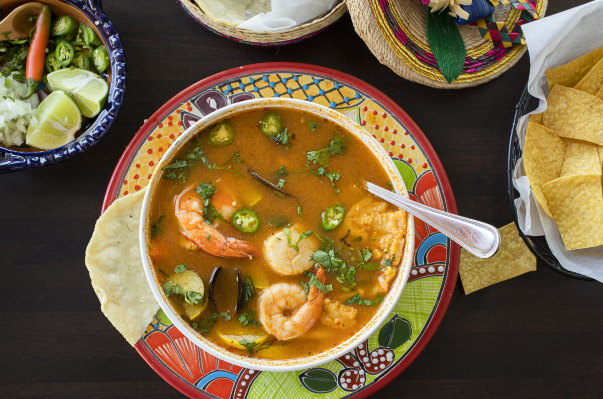 Caldo De Siete Mares is a seafood soup of scallops, mussels, shrimp, crab, octopus, and white fish in broth with vegetables from Cielito Lindo restaurant in Santa Rosa. (Photo by John Burgess/The Press Democrat)