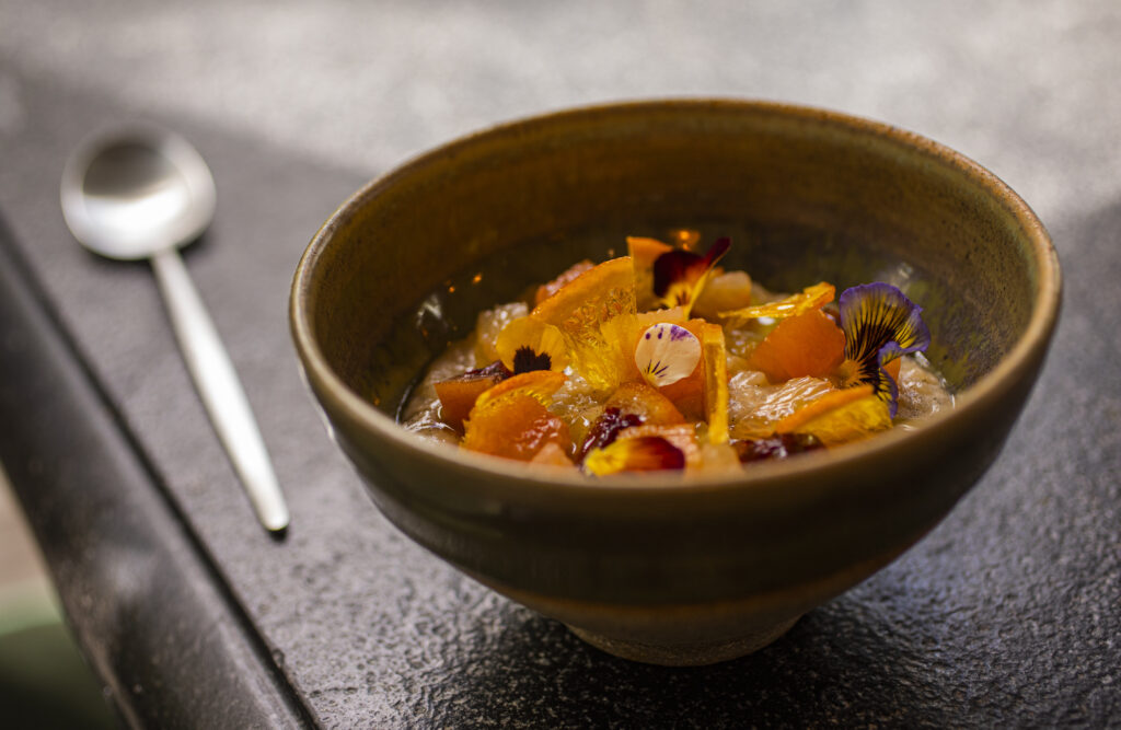 Chef Bryan Oliver's rice pudding with baba au amaro and spring citrus at Little Saint in Healdsburg. (Chad Surmick / The Press Democrat)