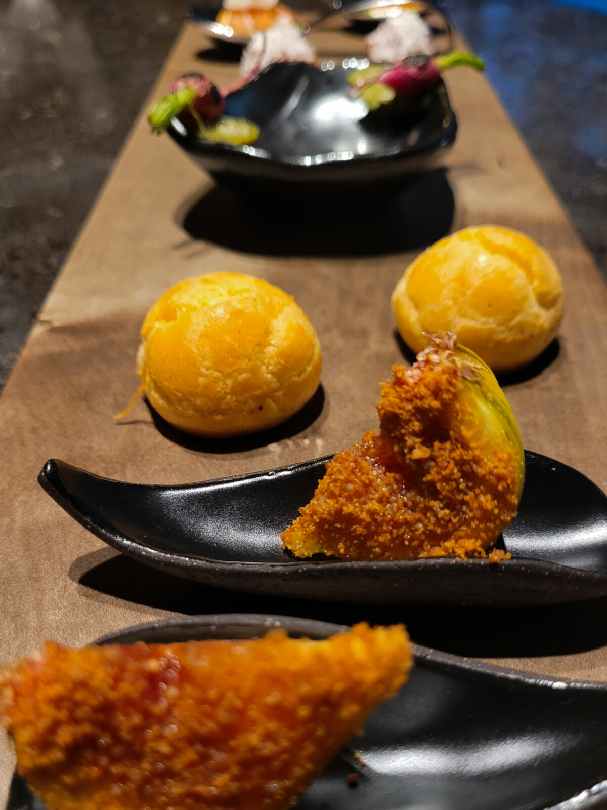 Canapes include Sweet Fig with Chorizo, and Gougère with Comté Fondue on the opening menu at Cyrus restaurant in Geyserville. (Heather Irwin / Sonoma Magazine)