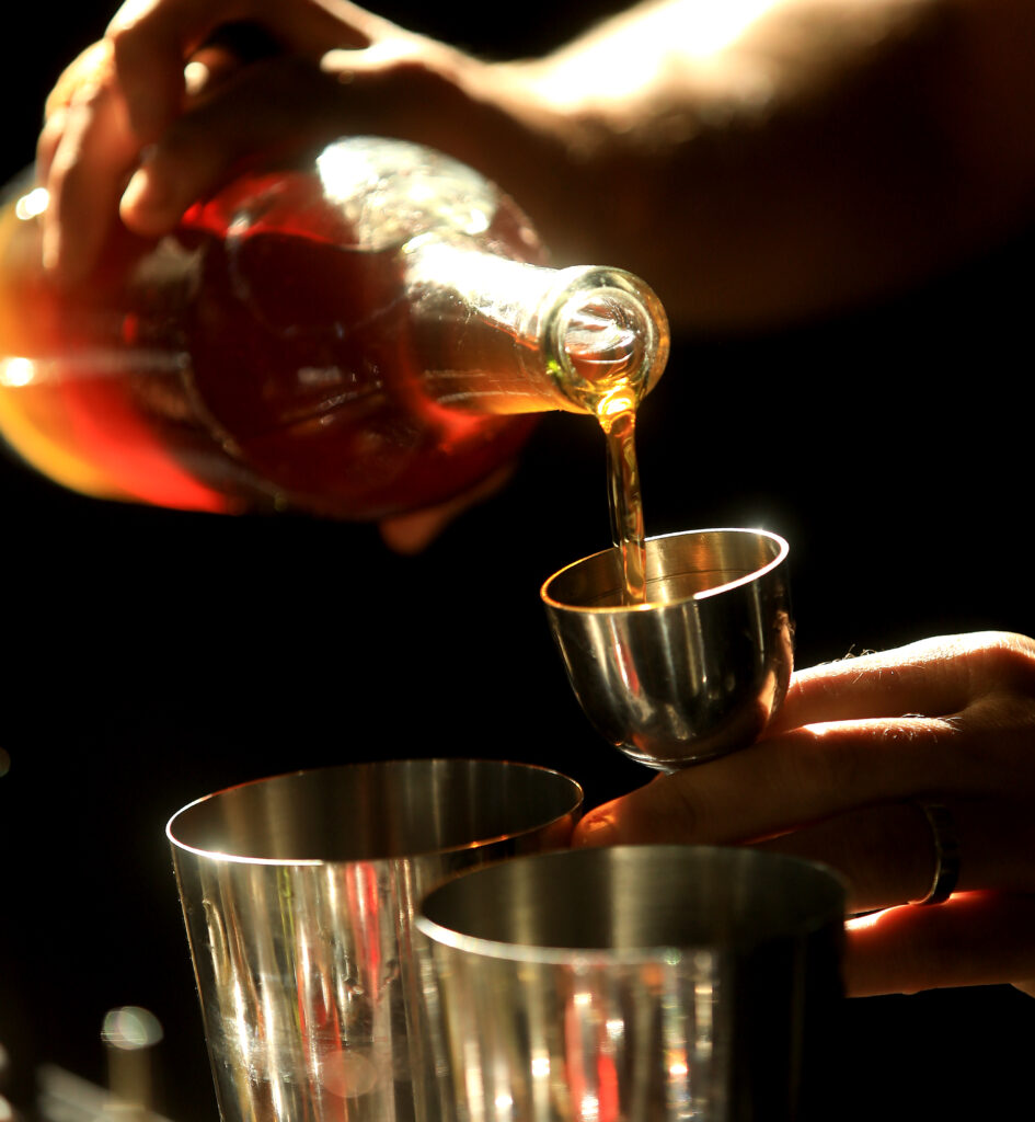 Ingredients are added to a mixed drink at Little Saint in Healdsburg, Wednesday, July 21, 2022. (Kent Porter / The Press Democrat) 2022