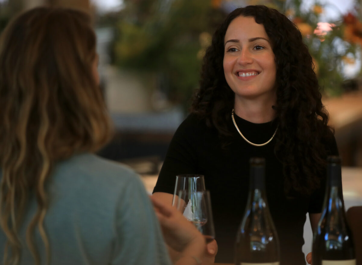 Alex Sarovich, wine director Little Saint in Healdsburg, tastes new release wines from Ashley Holland's, Read Holland Wines, July 27, 2022. Holland is the owner-proprietor-winemaker of the Raead Holland (Kent Porter / The Press Democrat) 2022