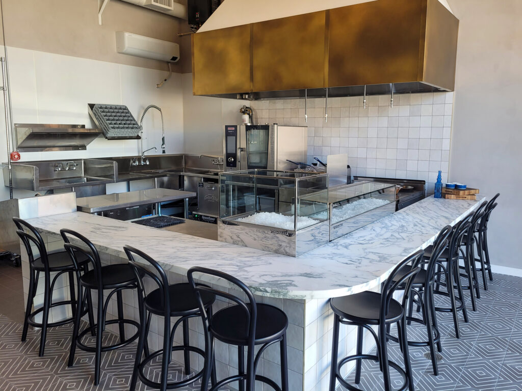 Chairs line the bar inside Oyster, a new Parisian-style seafood cafe opening in Sebastopol. (Heather Irwin / The Press Democrat)