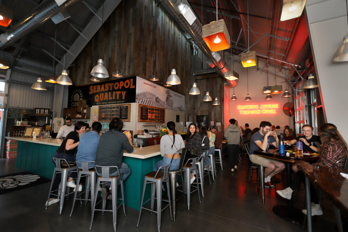 People gather inside Golden State Cider Taproom during trivia night presented by North Bay Trivia, Thursday, October 13, 2022, in Sebastopol. (Darryl Bush / For The Press Democrat)