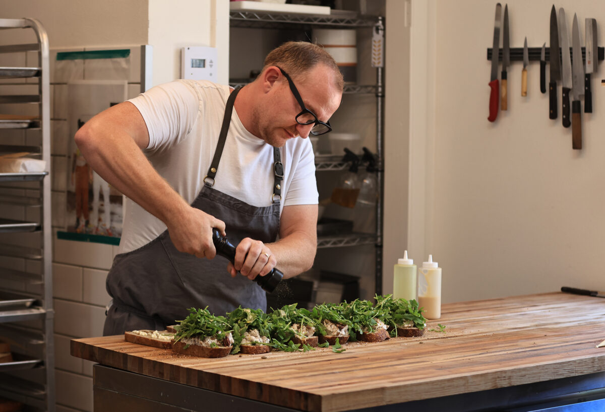At Troubadour Bread and Bistro in Healdsburg, Chef Sean McGaughey prepares sandwiches during the day and French dinners at night for Le Diner. (Kent Porter/The Press Democrat) 