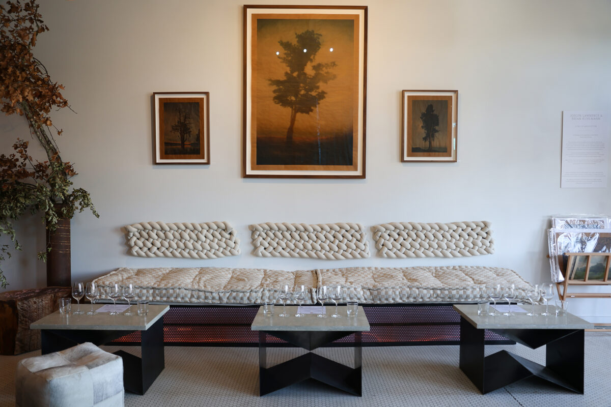 Artwork by Joslyn Lawrence and Brian Kuhlman are on display above a seating area at Bannister Wines tasting room in Geyserville on Thursday, October 6, 2022. (Christopher Chung/The Press Democrat)