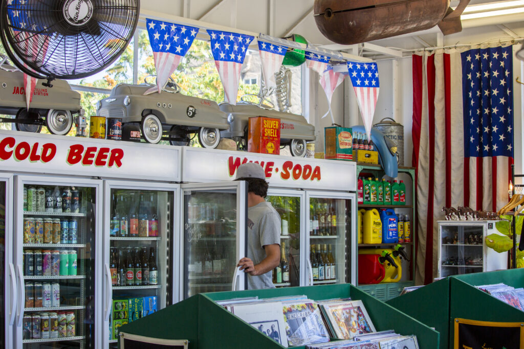 Beer, wine and sodas are staples at Jack's Filling Station on Broadway, which sells gas, vintage vinyl records, and an assortment of sundries. The retro vibe is prominent throughout the building, and there are many small still lives scattered around the store, on Thursday, June 24, 2021. (Robbi Pengelly)