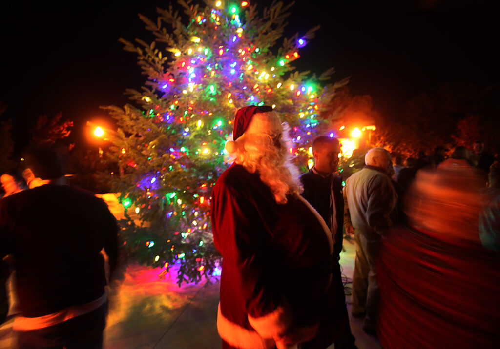 Santa was on hand for the Geyserville tree lighting ceremony Saturday Nov. 24, 2012, prior to the Geyserville tractor parade . The parade included farm equipment, fire trucks and tractor trailer rigs. (Kent Porter / The Press Democrat, file) 