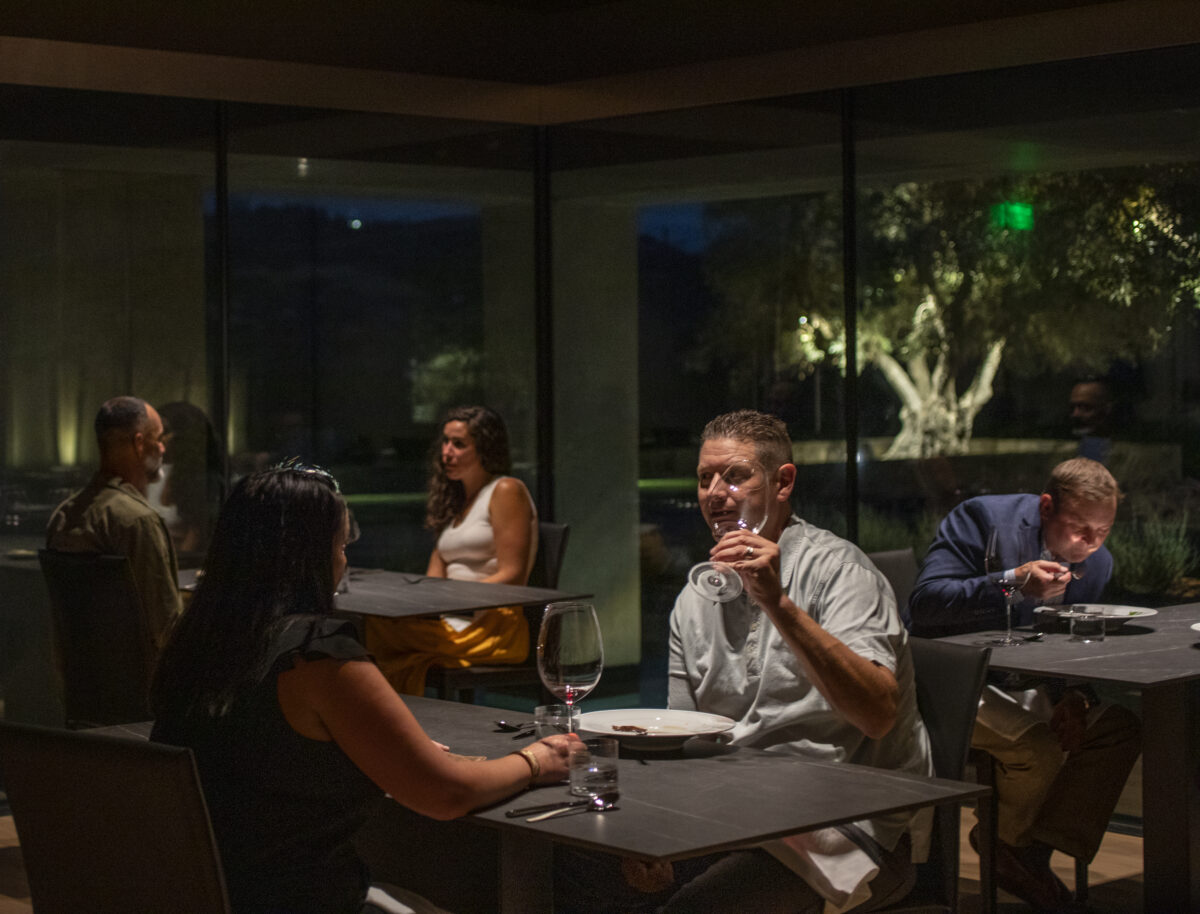 During a family and friends pre-opening night guests enjoy the dining room at sunset of the Alexander Valley at Cyrus in Geyserville on Thursday September 8, 2022. (Chad Surmick / Press Democrat)