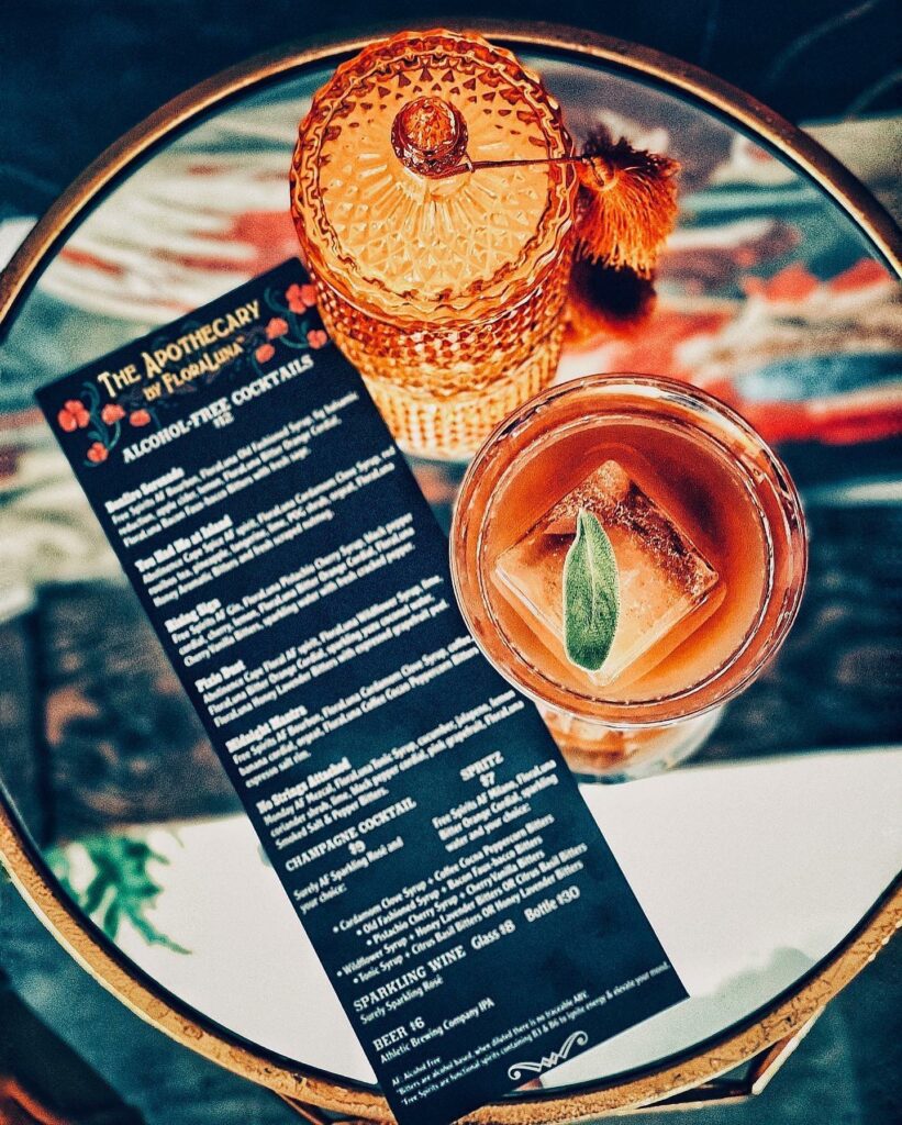 The Bonfire Serenade cocktail features apple cider, fig balsamic reduction, Flora Luna Old Fashioned Syrup, Bacon Faux-Bacco Bitters with aromatics from fresh sage, and Free Spirits alcohol-free Bourbon. (Phaedra Achor)