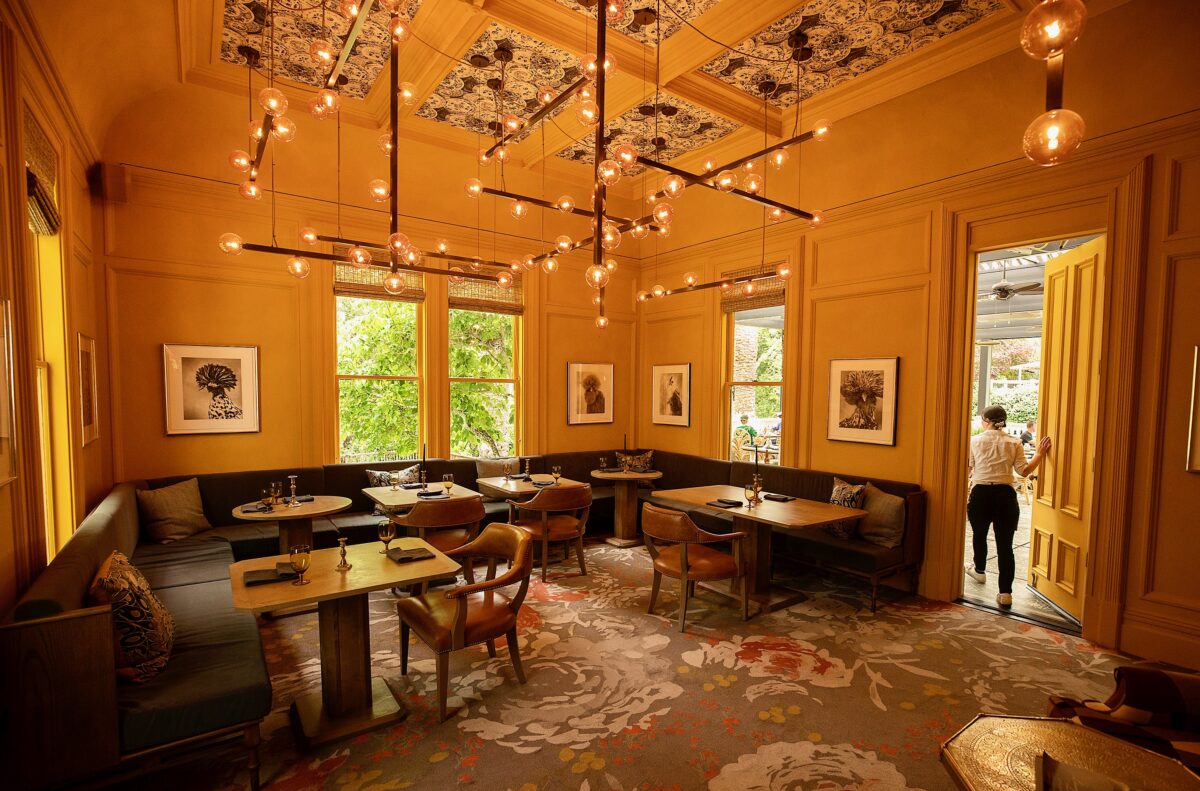 A warm ambiance in one of the three dining areas at The Madrona in Healdsburg. (John Burgess/The Press Democrat)